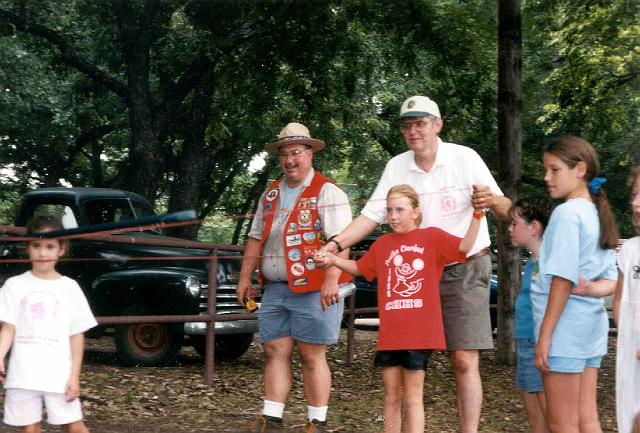 Bob Eilenfeldt helps Kaitlyn Patrick as Marty, Kami and Jennifer look on.jpg